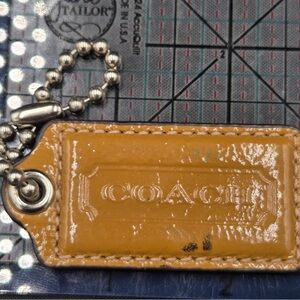 Coach Yellow Leather Hangtag- Damaged